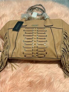 GUESS Tan Fringe Satchel with Stud and Grommet Detail
